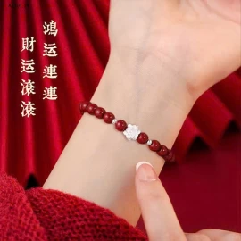 AGOVSKI - vòng chu sa hoa sen bạc S999 sỉ 170k